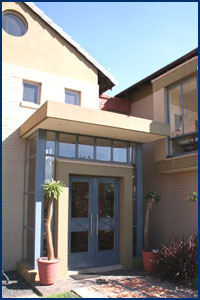 Double Storie House With Glass Door Entrance